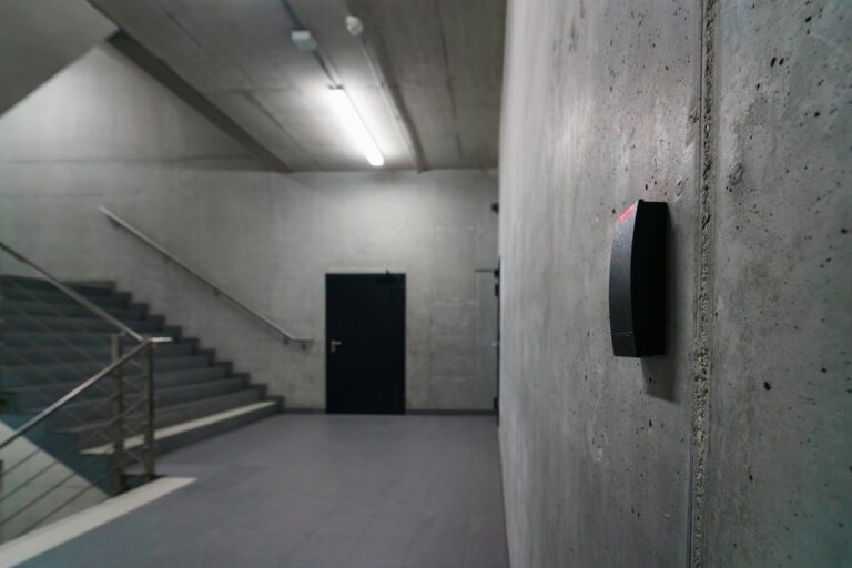 Key fob system reader beside an office stairwell door, a common setup for Windsor businesses